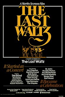 A poster with the Band standing in silhouette, surrounded by extensive credits of the guest musicians and an elaborate logo