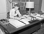 Mary Jean Bowman working at her desk