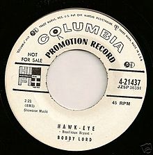 Transitional 1955 promo 45 r.p.m. label showing both the old notes and mike and new walking eye logos Columbiatransitionallabel.jpg