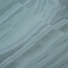 A close up of a polished slab of green Westmorland Green Slate from Honister. Honister green slate1.gif
