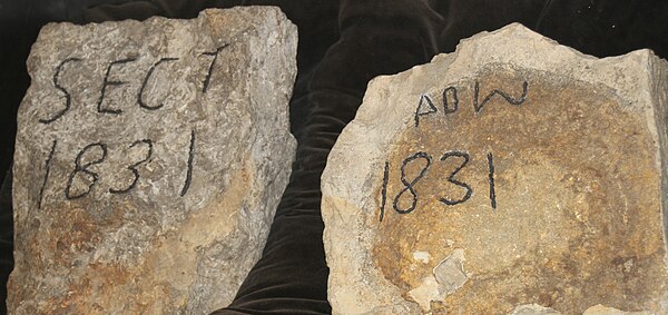 Stone from the Southeast Corner of the Temple and a "witness marker" for the cornerstone on the northeast corner on exhibit in the Temple Lot museum. 