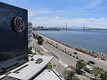 SM Seaside City with the South Road Properties (SRP) and the Cebu-Cordova Link Expressway (CCLEX) at the background SM Seaside City, SRP and CCLEX (Cebu City; 09-07-2022).jpg