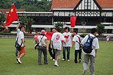 A group of youths surrounded a suspected Tibet supporter demonstrating during the torch relay in Kuala Lumpur. Confrontation Pro-China supporters and a Pro-Tibet supporter during the 2008 Olympic Torch relay.JPG