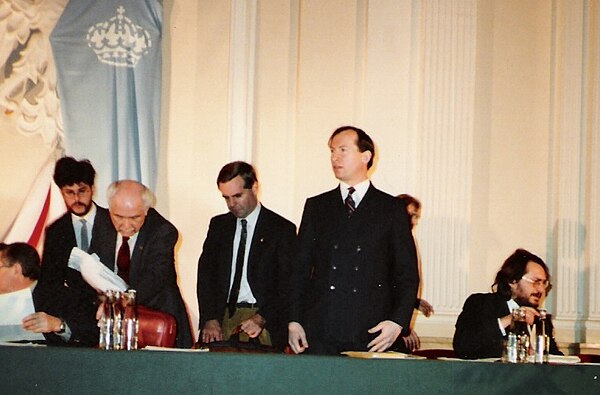 European Monarchist Congress, Warsaw, 8–9 Dec 1990. Gregory Lauder-Frost standing centre, Paul Benoit, Vice-President of the ML of Canada is to his ri