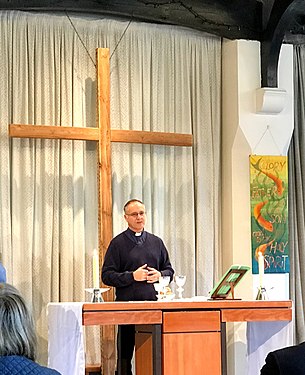 Rev. Steve Newbold celebrating communion