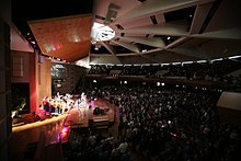 Men praying at the No Regrets Conference No Regrets Conference Praise.jpg