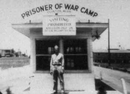 Camp Clinton entrance in 1943.  The sign reads "Prisoner of War Camp Clinton, Miss."