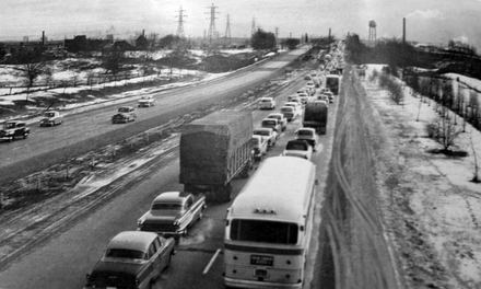 Long traffic jams, such as this one entering Toronto prior to the construction of the Gardiner Expressway, became commonplace on the unupgraded highway.