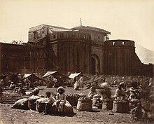 The imposing walls of the Shaniwar Wada, in an 1860 photograph Shaniwarwada 1860.jpg