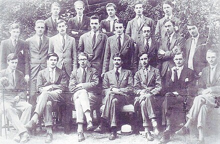 The Uffizi Society Oxford, ca. 1920. First row standing: later Sir Henry Studholme (5th from left). Seated: Lord Balniel, later 28th Earl of Crawford (2nd from left); Ralph Dutton, later 8th Baron Sherborne (3rd from left); Anthony Eden, later Earl of Avon (4th from left); Lord David Cecil (5th from left).