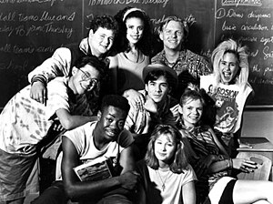 Promotional image of the cast of Degrassi High. Back row L-R: Siluck Saysanasy, Darrin Brown, Anais Granofsky, Stefan Brogren, and Amanda Stepto. Front row clockwise from left: Dayo Ade, Pat Mastroianni, Cathy Keenan, and Stacie Mistysyn. Degrassi High cast.jpg