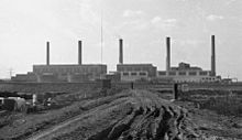 Littlebrook C, B and A Power Stations, viewed from the east in 1974. The River Thames is out of shot to the right. The A, B and C Stations were built in line successively further from the Thames. This shows them shortly after the A Station was closed. The D Station was later built to their west. Littlebrook Power Station ABC.jpg