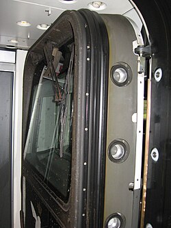 Two IC3 trains coupled together, the front door swung aside. Notice the large pins (retracted) which are responsible for keeping the door shut when the cab is used IC-3-coupled.jpg