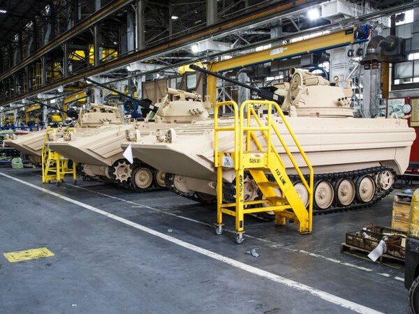 Opposing-Forces Surrogate Vehicles (OSVs) undergoing maintenance at Anniston Army Depot