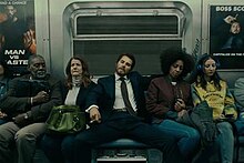 Swift played a man (middle) in the music video for "The Man" (2020) to ridicule sexist double standards. Tyler Swift manspreading.jpeg