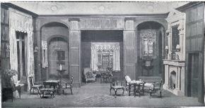 Set used for Acts I and II of 1928 London production. Sir Roger Ackroyd's study (with open doors) where the murder takes place is seen at rear centre of set Alibi set.jpg