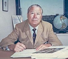 Fred Corcoran at desk.JPG