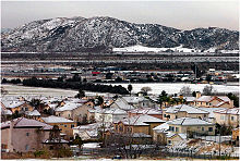 Snow on the ground in San Bernardino, Shandin Hills visible in the background Sbsnow 2.jpg