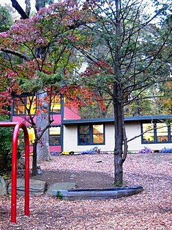 One of the newer buildings as it appeared in the early evening during one 3rd-4th grade's after school campfire and dusk study.