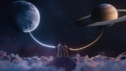 Swift and Ice Spice holding the Moon and Saturn using a mystical lasso, with the constellations Sagittarius and Capricornus behind them, respectively. Karma - Taylor Swift ft. Ice Spice (music video screenshot).png