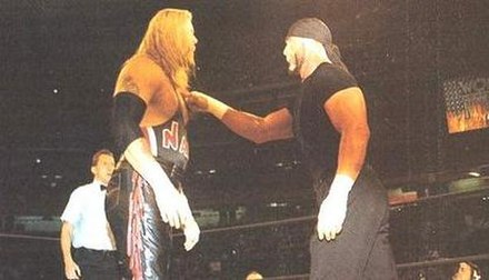 The Fingerpoke of Doom: Hollywood Hogan taps Kevin Nash on the chest while Billy Silverman looks on