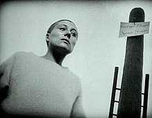 Falconetti in a scene from the film. Dreyer dug holes in the set to achieve the low camera angles such as the one used here.