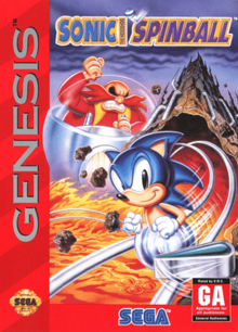 The game's North American cover art. The artwork shows Sonic the Hedgehog running in the foreground, while series antagonist Doctor Robotnik is angrily chasing him on a floating pod. The background shows the volcanic Mt Mobius erupting. Pinball flippers can be seen at the bottom.