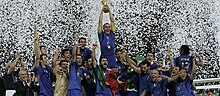 Players of the Italy national football team lifting the World Cup trophy ItalyWC2006win.jpg