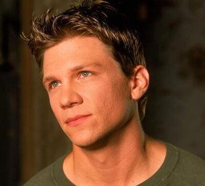 Marc Blucas as Riley Finn.