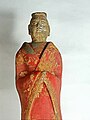 A pottery figure wearing Han Chinese style attire, Northern Wei (471 - 499 AD). The garment has a youren opening.