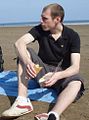 A picture of Stephen Rance sat on the beach.jpg