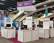Interop booths at the 2015 RSA conference. Each vendor interoperates with each other vendor. OASIA-KMIP-RSA2015-Booth.jpg