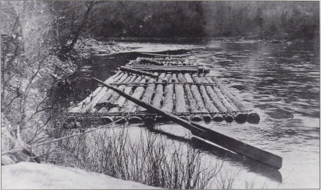 A log raft on Pine Creek