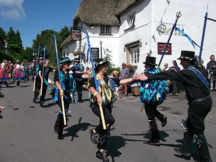 Stave dancing on Dartmoor, Devon. Bradninch Millers perform a Stourton Caundle dance "Arches". Stave dance.jpg