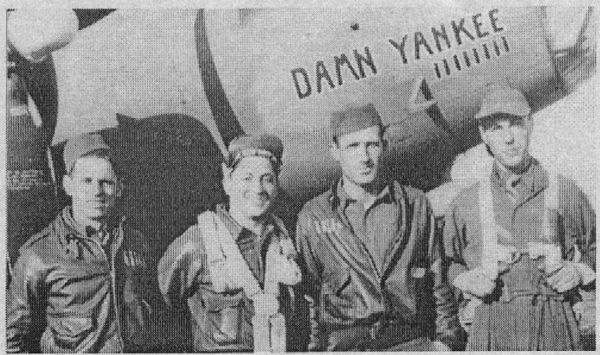 Four of ten crew members of B-17F Damn Yankee. L-R. Top turret gunner, Sgt. William Ramsey; waist gunner, Sgt. Michael J. Cappelletti; bombardier, Sgt