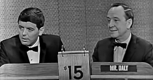 ”The First Family” President Kennedy impersonator Vaughn Meader's appearance as the “Mystery Guest” on CBS Television's What’s My Line the evening of the 1962 NFL Championship Game, December 30, 1962. John Charles Daly is on the right.