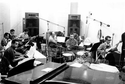 Members of the Wrecking Crew employed for a session at Gold Star Studios in the 1960s. Seated left to right: Don Randi, Al De Lory, Carol Kaye, Bill P