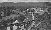 The narrow gauge wooden viaduct over the Torridge in 1905 Torringtonviaduct.jpg