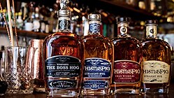 Boss Hog V next to the 15-year, 12-year, and 10-year rye whiskeys WhistlePig Lineup.jpeg