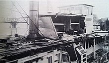 Damage to Grahamona following collision with swinging portion of Morrison drawbridge; note Hawthorne Bridge in backgournd. Grahamona damaged by bridge, 1916.jpg