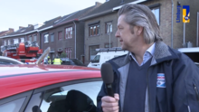 Screenshot from local 1Limburg TV press interview, with damaged car and emergency response vehicle in background. Longtail Aviation Flight 5504 aftermath meerssenaren-over-vliegtuig-gaat-ie-vallen-niet.png