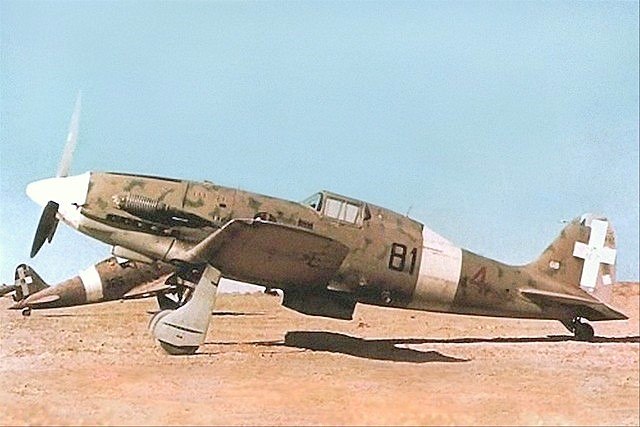 An early Macchi C.202 (note lack of radio mast) of 81ª Squadriglia, 6° Gruppo, 1° Stormo CT; this photo appears to have been taken in Libya.