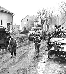 American soldiers of the 378th Infantry Regiment enter Metz, 1944. EnteringMetz.jpg