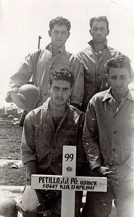 John Stompanato (bottom left) during the Pacific War in WWII, with his comrades gathering behind the grave of Pfc. Joseph J. Petillo of Asbury Park, New Jersey. KIA Okinawa