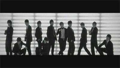 Super Junior posing right before the first dance break in the beginning of "Sorry, Sorry".