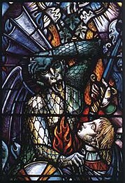 Christian battles Apollyon in one of the stained glass windows in Robin Chapel