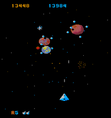 Fighting three planets with moons while an astronaut floats by ARC Mad Planets.png