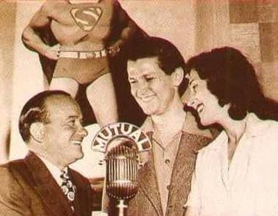 National (DC) Comics publisher Harry Donenfeld (left) with Bud Collyer and Joan Alexander