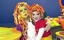 Dirce Migliaccio and Isabelle Drummond as Emília for the 2004 television special Estação Globo.