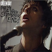 Cover artwork of "Wake Me Up When September Ends": Billie Joe Armstrong looks upwards while singing into a microphone. The song's title and "Green Day" are printed in the top-left corner.